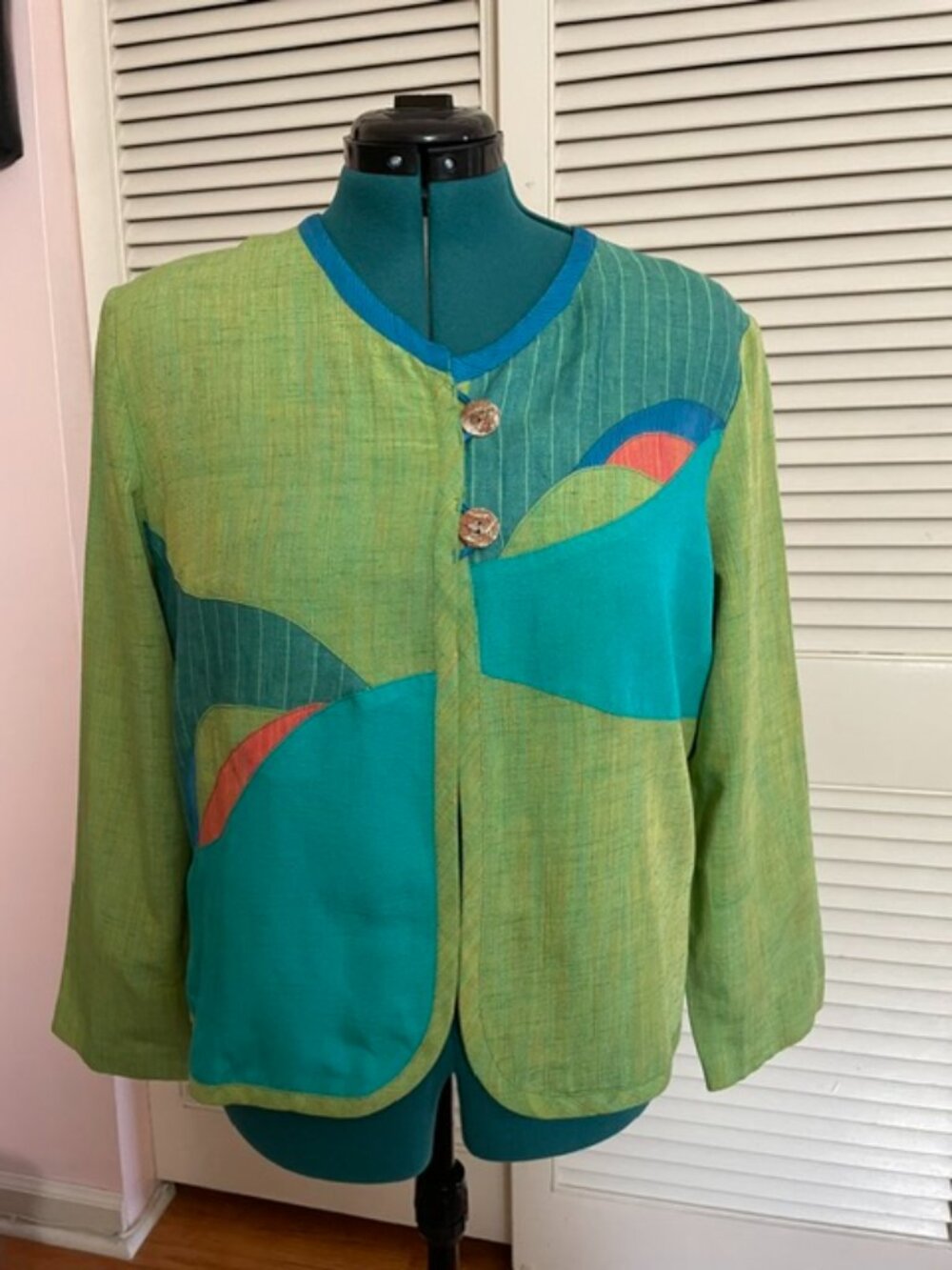 CanvasBacks artistic jacket with a contemporary, color-blocked design